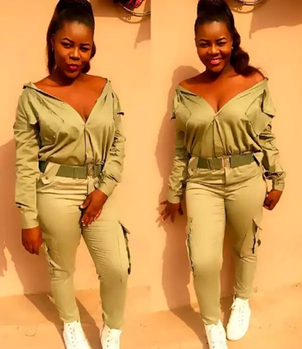 NYSC member got people talking as she bares cleavage in her uniform (Photo)